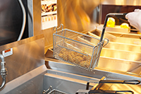 grease fryer in restaurant kitchen